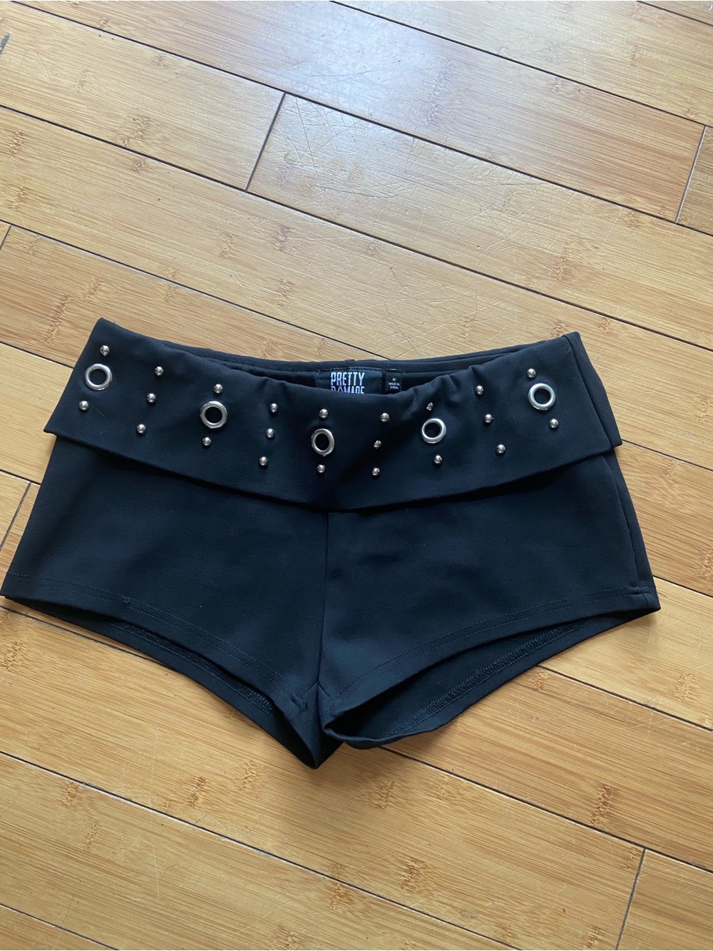 Pretty Damage Black High-Waist Grommet & Stud Bike Shorts